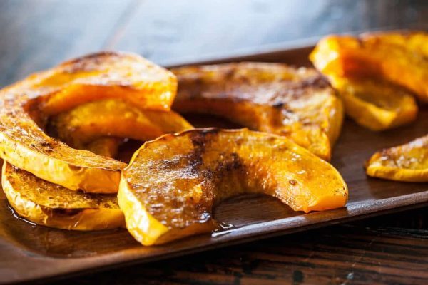 roasted pumpkin slices on a tray