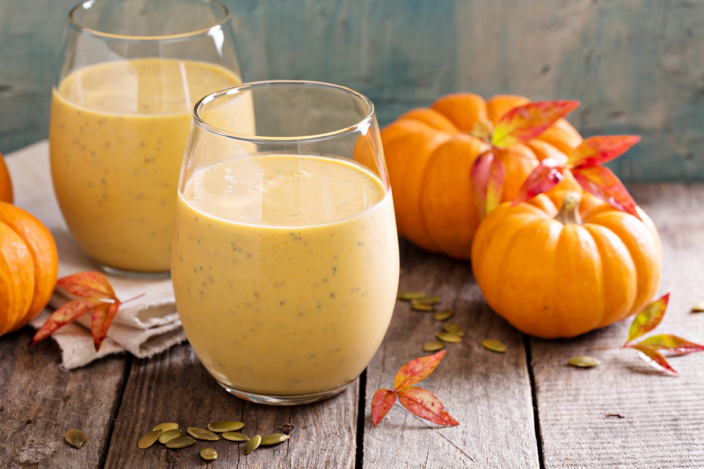 two glasses filled with pumpkin smoothie